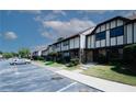 A row of townhomes with well-maintained lawns and convenient parking spaces at 1199 Ashborough Se Dr # K, Marietta, GA 30067