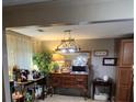 Dining area featuring modern chandelier and ample storage space at 6290 S Skyline Dr, Douglasville, GA 30135