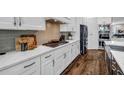 Gourmet kitchen with custom cabinets, stainless steel appliances, and granite countertops at 1120 Cordia Nw Ave, Atlanta, GA 30318