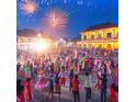 Image of a festive outdoor celebration at night with a crowd and fireworks in the background at 5620 Moresby Ct, Alpharetta, GA 30022