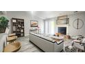 Bright living room with fireplace, modern furnishings, and stylish decor at 4052 Keheley Glen Ne Dr, Marietta, GA 30066