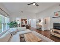 Bright open-concept living room featuring vaulted ceilings and hardwood floors, perfect for relaxing at 1443 Metropolitan Se Ave, Atlanta, GA 30316