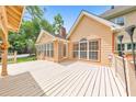 Inviting backyard deck with a view of the landscaped yard and the home's exterior at 915 Chipley Ct, Marietta, GA 30062
