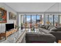 Living room featuring a large window offering great natural light and a view of the outdoors at 145 15Th Ne St # 409, Atlanta, GA 30309