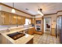 Well-equipped kitchen features plenty of storage and durable granite countertops at 1935 Shrader Ct, Lawrenceville, GA 30044