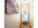 Hallway has hardwood floors, a neutral color, and natural light at 559 Woodland Park Ter, Lawrenceville, GA 30043