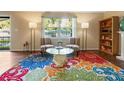 Inviting living room with hardwood floors, and a bright window with natural light at 3147 Buford Ne Hwy # 2, Atlanta, GA 30329