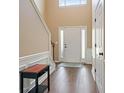 Inviting foyer with hardwood floors and staircase leading to the upper level at 3235 Northcliff Dr, Suwanee, GA 30024