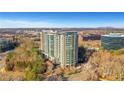 Contemporary high-rise condominium building with city and wooded views at 3300 Windy Ridge Se Pkwy # 1603, Atlanta, GA 30339