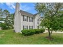 Charming two-story home featuring a manicured front lawn and inviting curb appeal at 331 Overlook Turn Nw, Conyers, GA 30012