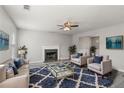 Comfortable living room featuring modern furniture, a fireplace, and stylish decor at 331 Overlook Turn Nw, Conyers, GA 30012