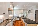 Beautiful kitchen with granite countertops, stainless steel appliances, and custom cabinets at 2639 Acorn Ne Ave, Atlanta, GA 30305