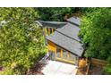 Overhead view showcasing the architectural design, roof, and wooden window frames of the home at 2155 Venetian Sw Dr, Atlanta, GA 30311