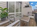 A cozy outdoor deck featuring modern seating and a leafy plant, perfect for relaxing or entertaining at 687 Banton Nw Dr, Atlanta, GA 30318