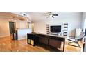 Bright living room featuring modern decor, hardwood floors, and an open floor plan at 2700 Pine Tree Ne Rd # 3009, Atlanta, GA 30324
