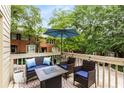 Relaxing outdoor patio with comfortable seating, perfect for entertaining or enjoying a quiet evening at 1341 Sheffield Glen Ne Way, Atlanta, GA 30329
