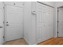 Clean hallway features neutral walls, closet, and doors at 1850 Cotillion Dr # 3215, Atlanta, GA 30338