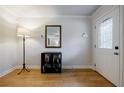 Bright entryway featuring hardwood floors, modern decor, and a stylish front door at 2985 Westbury Dr, Decatur, GA 30033
