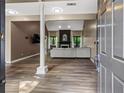Inviting living room features include hardwood floors and a cozy fireplace at 1694 Peachcrest Ct, Lawrenceville, GA 30043