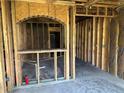 Unfinished basement space with exposed framing ready for customization at 678 Sweet Ashley Way, Loganville, GA 30052