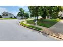 View of a mailbox along the street with other houses and greenery in the background at 130 Hazelhurst Dr, Covington, GA 30016