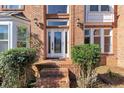 Close up of the home's entry way showcasing the leaded glass and brickwork at , Suwanee, GA 30024