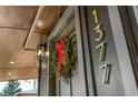 Close-up view of a decorative seasonal wreath hung upon the front door of the house at 1377 Dorothy Dr, Decatur, GA 30030