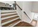 Beautiful staircase with wood and white accents at 2237 Foley Park St, Snellville, GA 30078