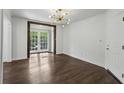 Inviting living room featuring wood floors, light walls, and classic design elements at 1072 Piedmont Ne Ave # 101, Atlanta, GA 30309
