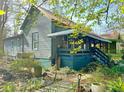 Exterior view of a charming home with a covered porch, showcasing its classic architecture and inviting outdoor space at 23 Gould Se St, Atlanta, GA 30315