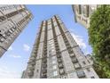 Tall building view with balconies and sky highlighting urban architecture at 195 14Th Ne St # 1706, Atlanta, GA 30309