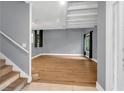Bright, open living room with hardwood floors and a view of the outdoor space at 260 Lamplighter Se Ln, Marietta, GA 30067
