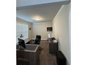 Bright and functional home office space with ample natural light and modern decor at 419 Woodmill Way, Atlanta, GA 30331