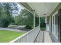 Inviting front porch offering ample space for relaxation and enjoying the outdoor scenery at 2650 Montego Dr, Buford, GA 30519