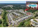 Aerial view showcases the community pool and surrounding neighborhood at 4255 Sunflower Cir, Cumming, GA 30040