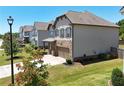 Beautiful home with a well-manicured lawn and a two-car garage, set in a friendly neighborhood at 4255 Sunflower Cir, Cumming, GA 30040