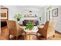 Cozy living room with hardwood floors, modern furnishings, and natural light from nearby windows at 4411 Paces Battle Nw, Atlanta, GA 30327