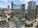 Modern glass skyscraper featuring a rooftop pool deck, set against the backdrop of the city skyline at 45 Ivan Allen Jr Nw Blvd # 2705, Atlanta, GA 30308
