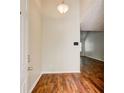 Inviting entryway with hardwood floors, neutral paint, and a view of the living area at 414 Pamela Ct, Mcdonough, GA 30252