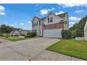 A delightful two-story home with a spacious driveway and a lovely front yard at 771 Franklin Mill Trce, Loganville, GA 30052