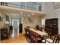 Two-story foyer with hardwood floors, staircase, and balcony overlooking the entry at 3740 Ashford Ne Pt, Brookhaven, GA 30319