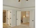 Bright open hallway leading to a bathroom and other rooms at 4020 Alligator Pt, Cumming, GA 30028