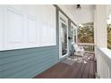 Relax on the front porch with white bench seating and enjoy the serene outdoor ambiance at 630 John Wesley Dobbs Ne Ave, Atlanta, GA 30312