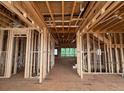 Interior framing of home showcasing the open floor plan and natural light at 3435 Dr Bramblett Rd, Cumming, GA 30028