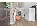 Welcoming entryway features hardwood floors, staircase, and stylish decor at 3 Tiffany Trce, Palmetto, GA 30268
