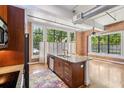 Open kitchen featuring stainless appliances, granite countertops, and hardwood flooring at 1261 Caroline Se St # 108, Atlanta, GA 30307