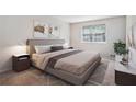 Comfortable bedroom with a large window, plush bed, and contemporary decor at 1151 Rankin St # 20A, Stone Mountain, GA 30083