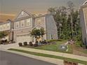 Charming two-story home with a brick facade, two-car garage, landscaped yard and a community walking trail at 150 Holden Way, Woodstock, GA 30189