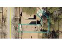 Aerial view of a home and its lot, showing the layout and surrounding neighborhood from above at 1520 Stoneleigh Cir, Stone Mountain, GA 30088