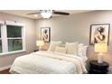 Comfortable bedroom featuring plush bedding, stylish decor, and abundant natural light at 4296 Langdon Dr, Decatur, GA 30035